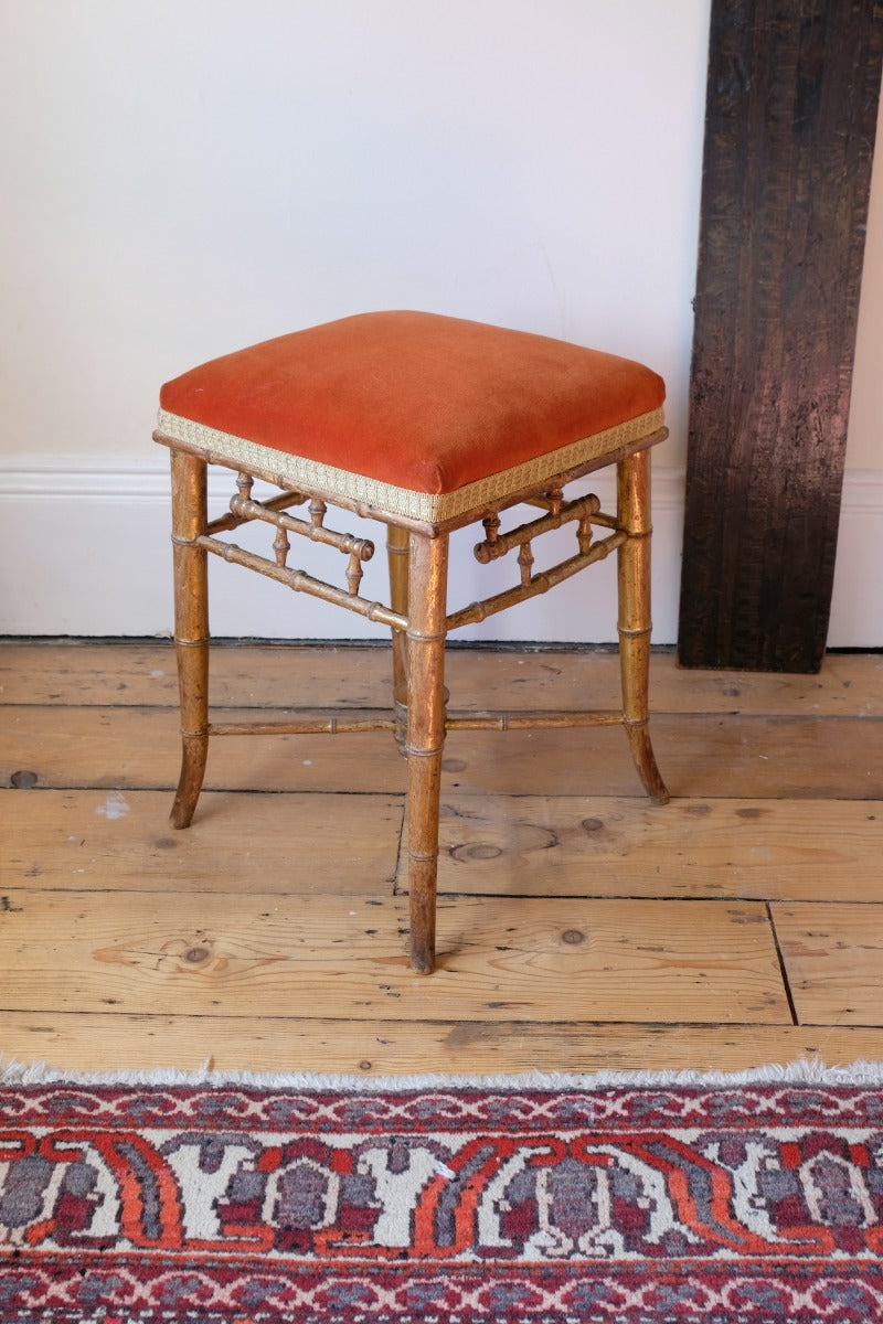 Regency giltwood faux bamboo music stool with swept out legs