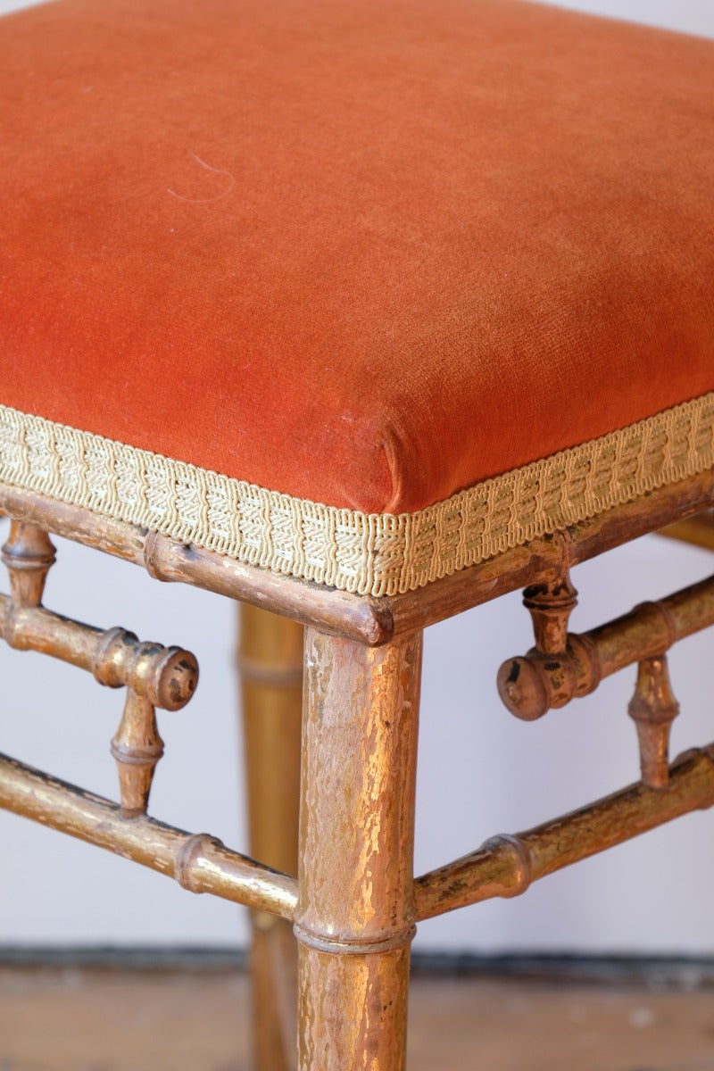 Regency giltwood faux bamboo music stool with swept out legs