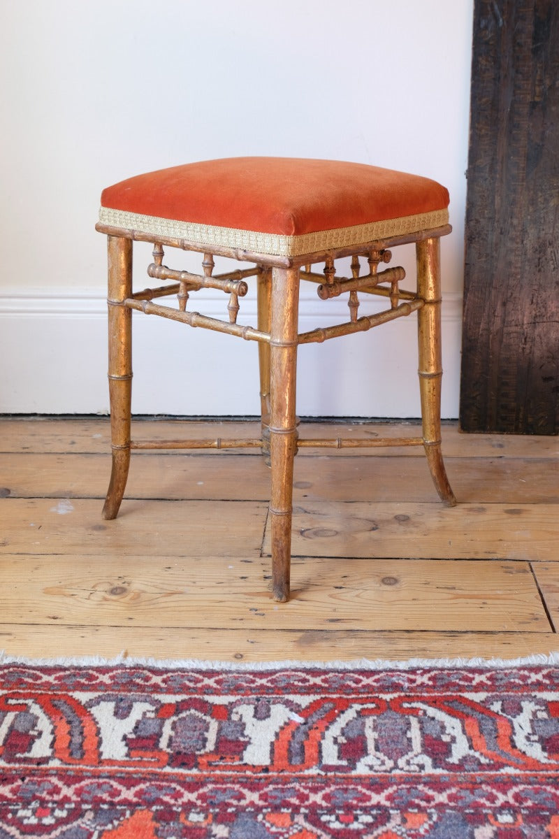 Regency giltwood faux bamboo music stool with swept out legs