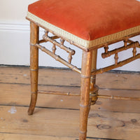 Regency giltwood faux bamboo music stool with swept out legs
