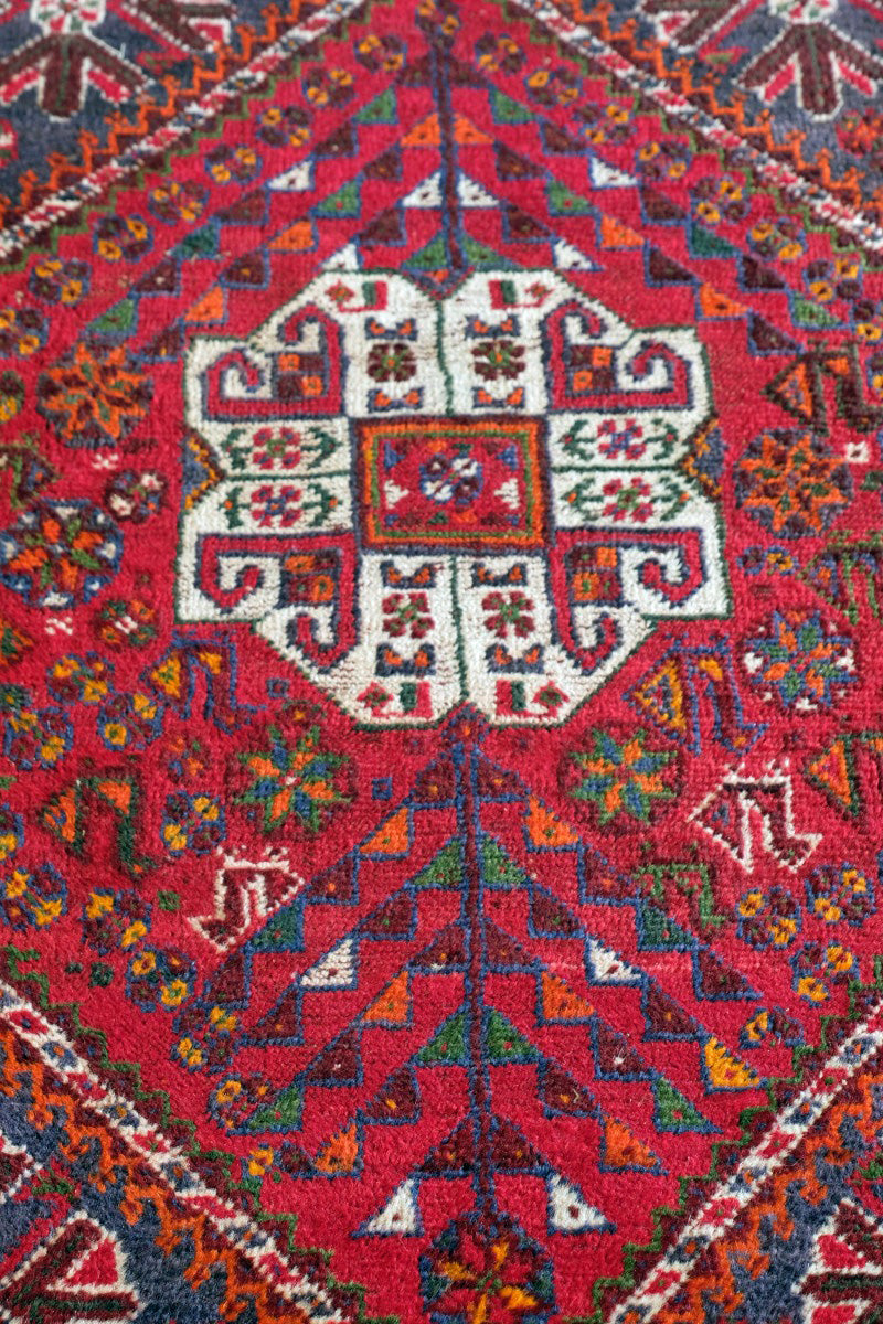 Persian Shiraz rug red ground animal motifs