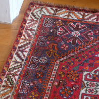 Persian Shiraz rug red ground animal motifs