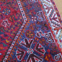 Persian Shiraz rug red ground animal motifs