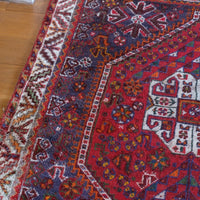 Persian Shiraz rug red ground animal motifs