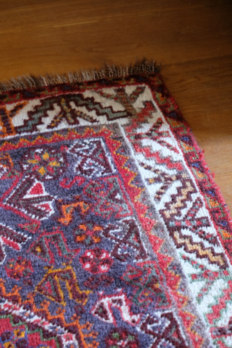 Persian Shiraz rug red ground animal motifs