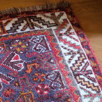 Persian Shiraz rug red ground animal motifs