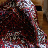 Persian Shiraz rug red ground animal motifs