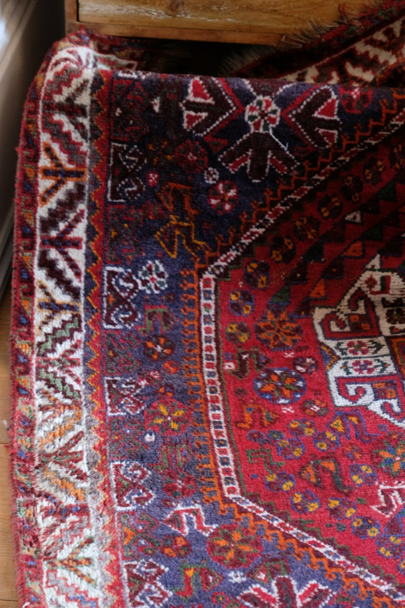 Persian Shiraz rug red ground animal motifs