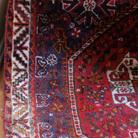 Persian Shiraz rug red ground animal motifs