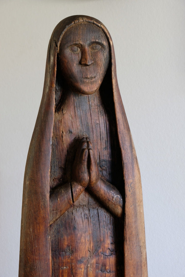 A 19th-Century Carved Madonna in Crimson Timber