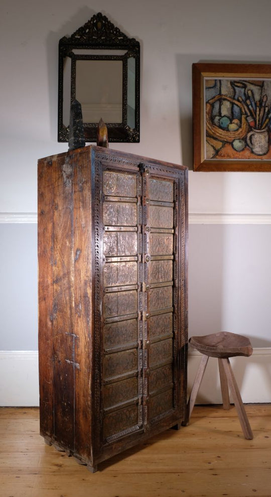 Teak, Brass and intricately designed cupboard doors