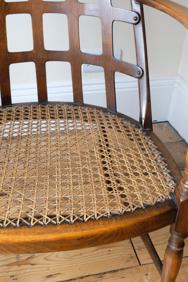 Rare Jas Shoolbred bentwood lattice back armchair with cane seat and pierced Arts & Crafts design