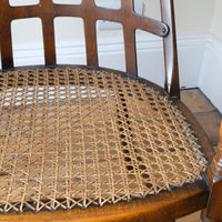 Rare Jas Shoolbred bentwood lattice back armchair with cane seat and pierced Arts & Crafts design