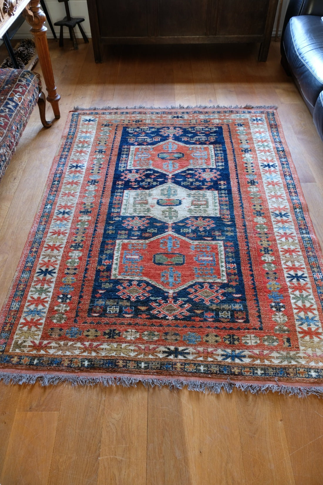 Caucasus Kazak wool rug with shield kazak medallions