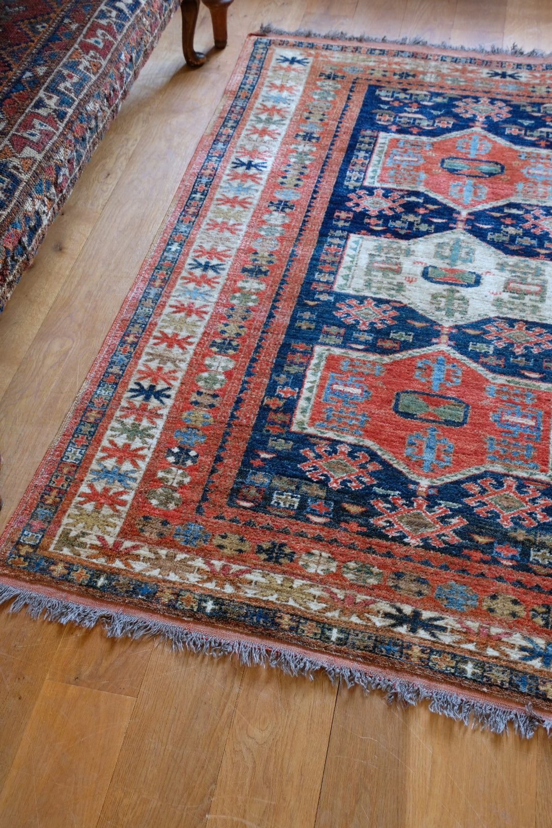 Caucasus Kazak wool rug with shield kazak medallions