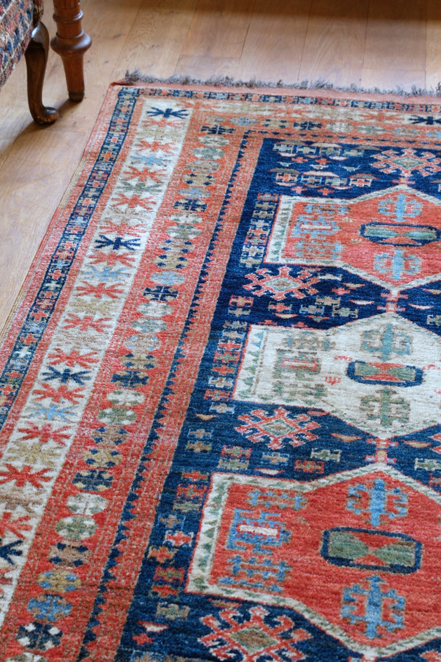 Caucasus Kazak wool rug with shield kazak medallions