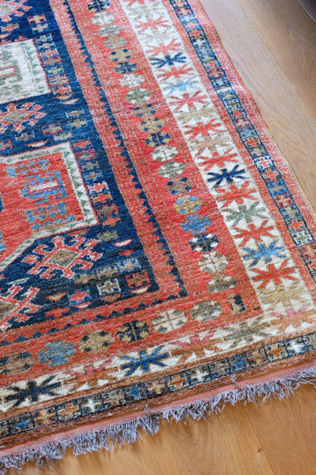 Caucasus Kazak wool rug with shield kazak medallions