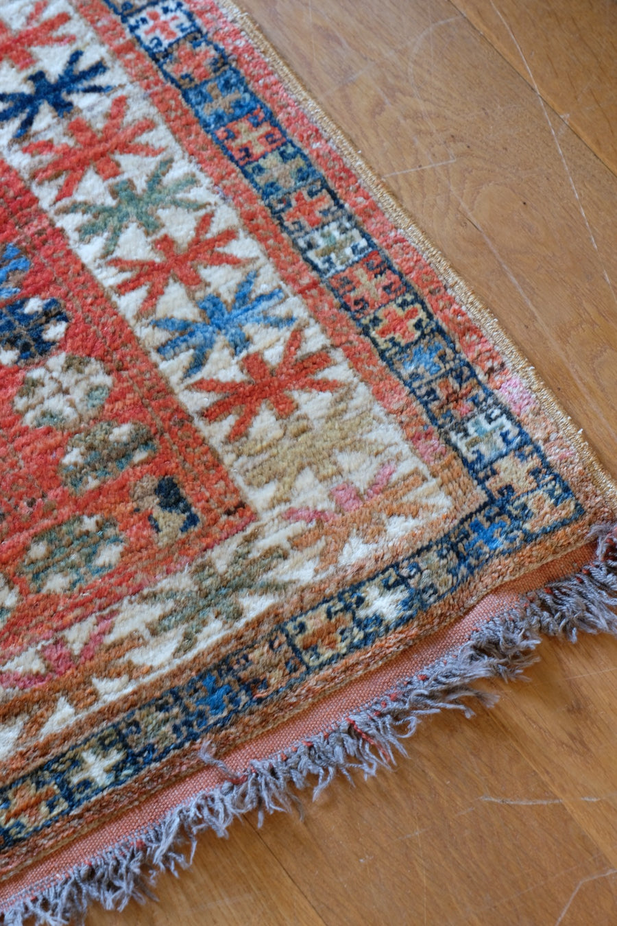 Caucasus Kazak wool rug with shield kazak medallions