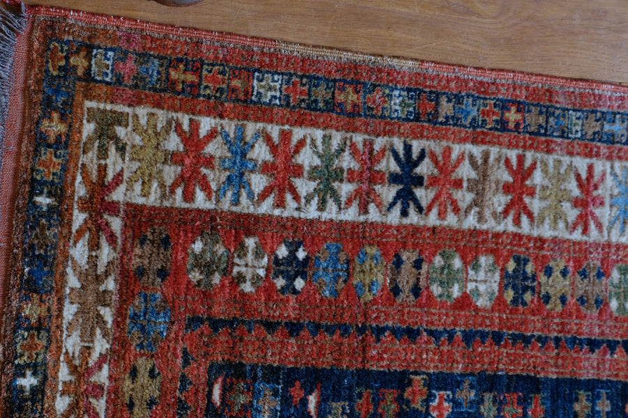 Caucasus Kazak wool rug with shield kazak medallions