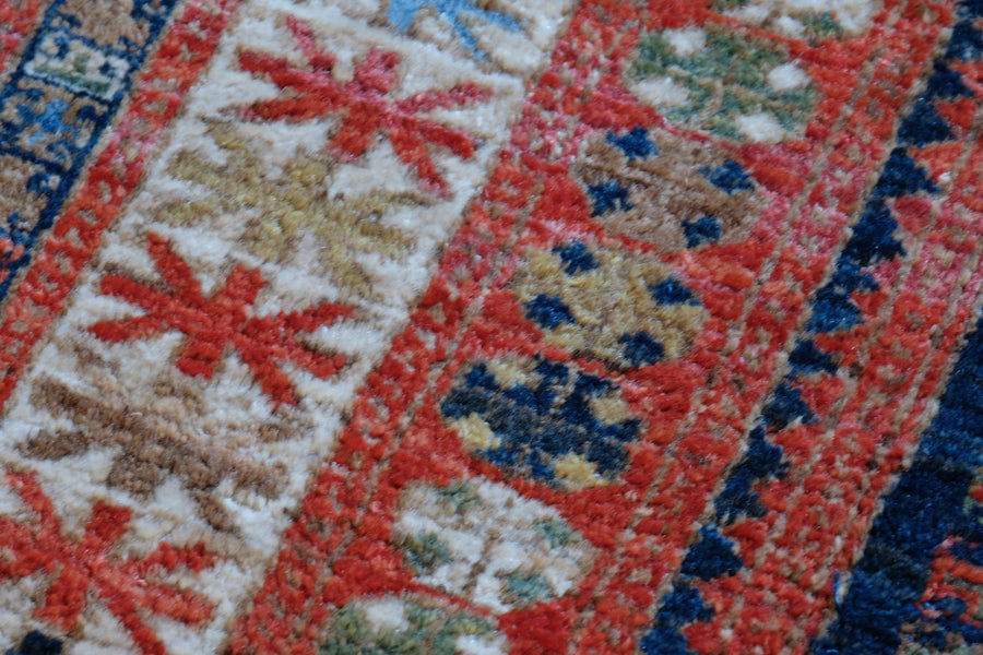 Caucasus Kazak wool rug with shield kazak medallions