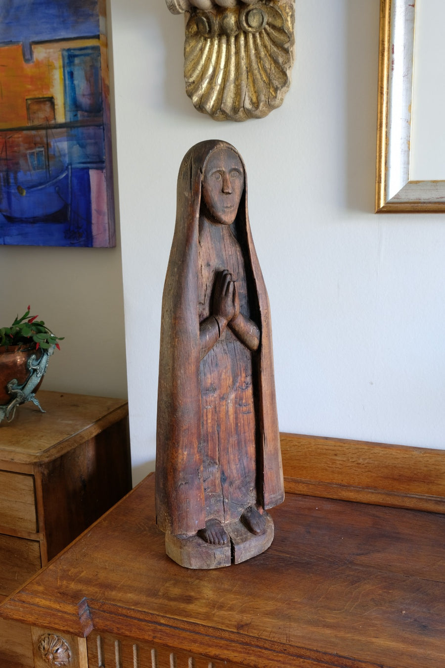 Antique carved sculpture statue of the Madonna