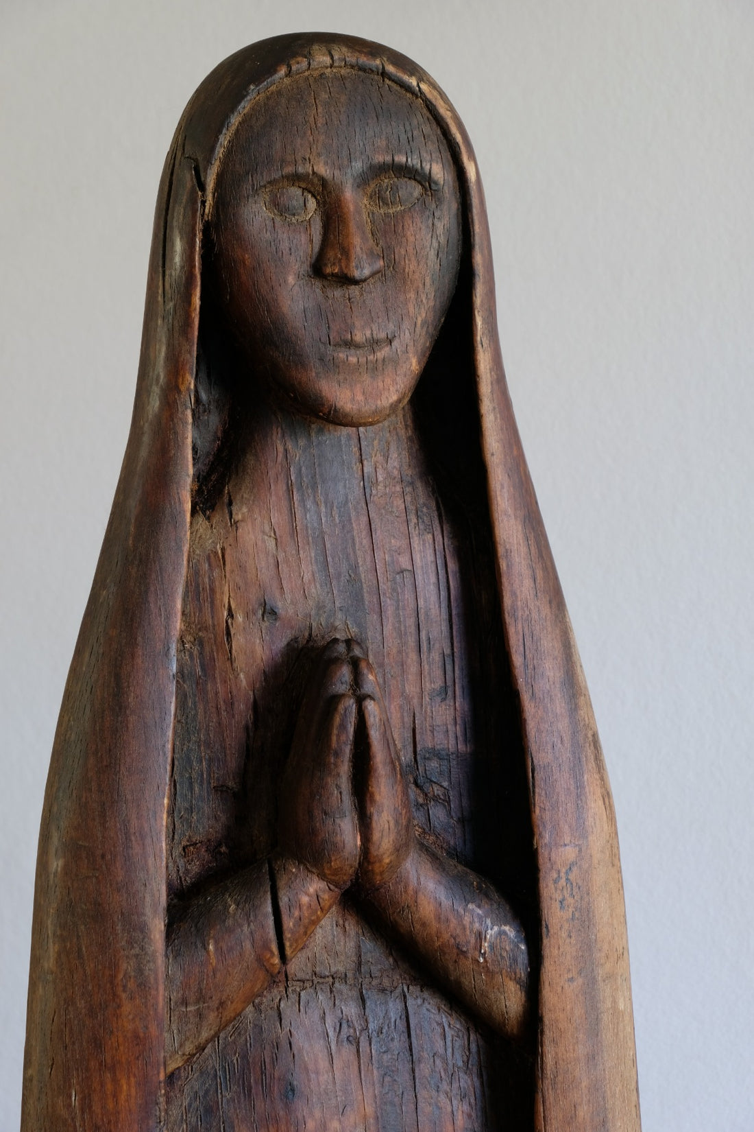 Antique carved sculpture statue of the Madonna
