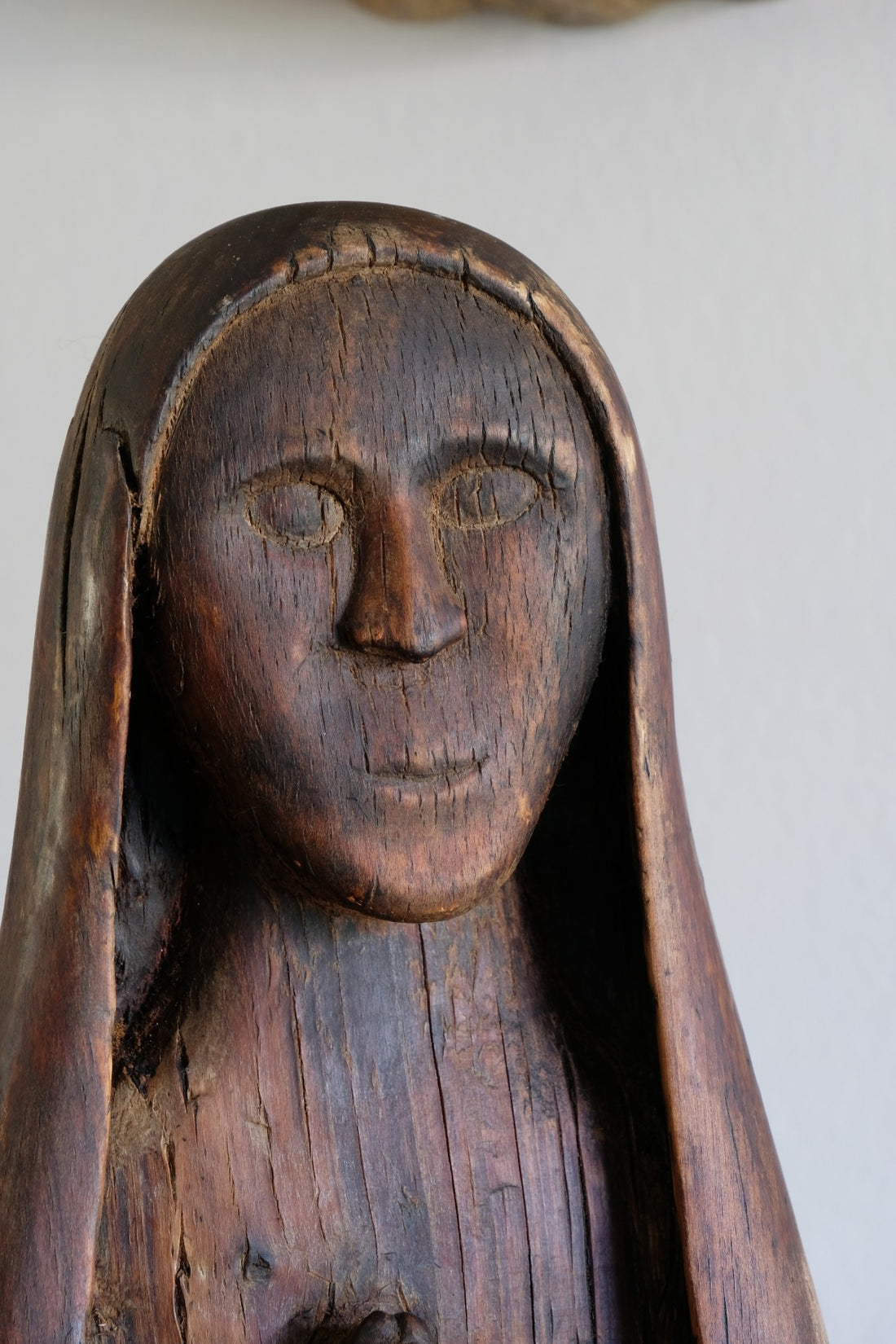 Antique carved sculpture statue of the Madonna