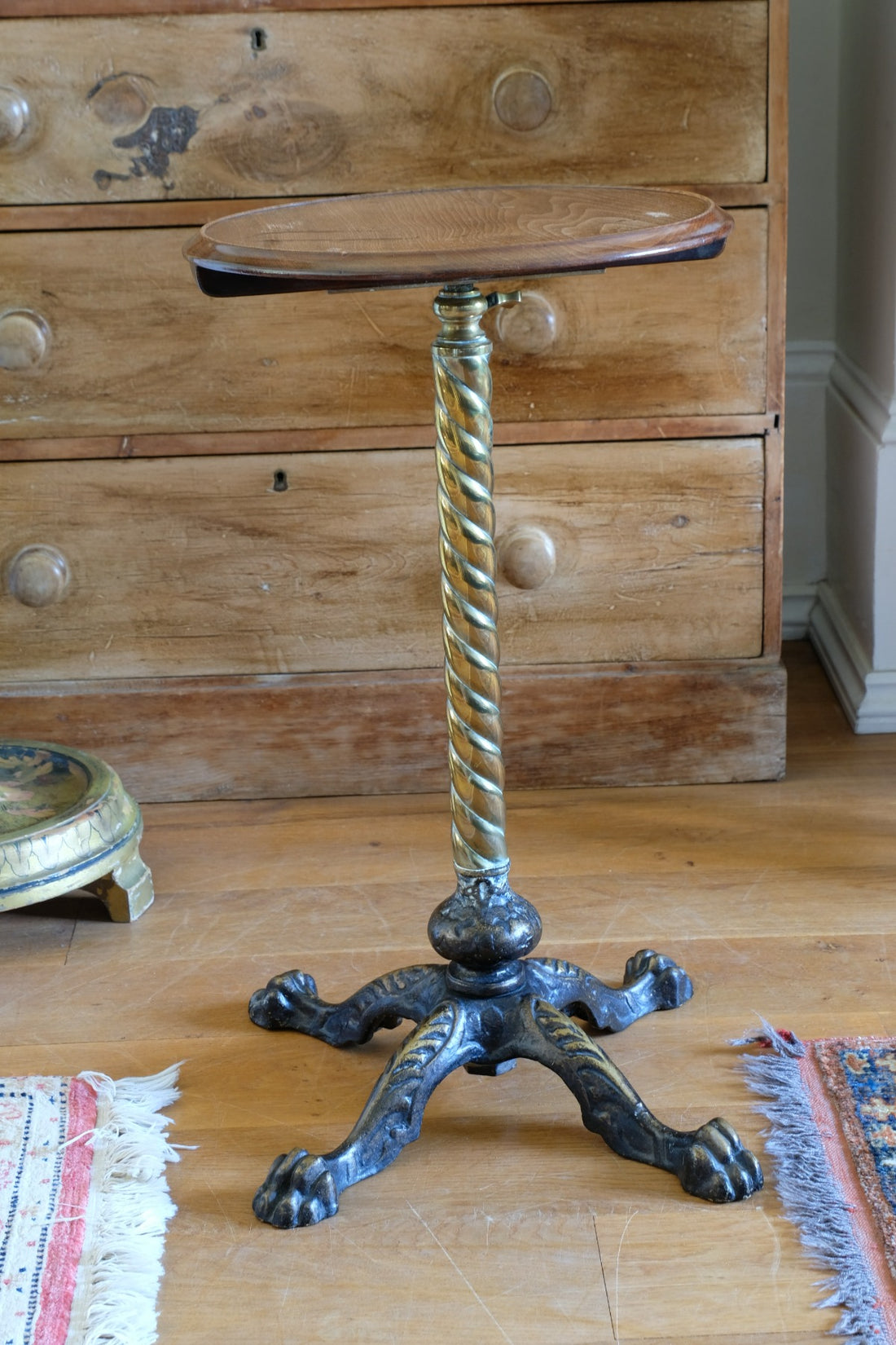 Antique brass telescopic wine table with twisted column and lions paw feet