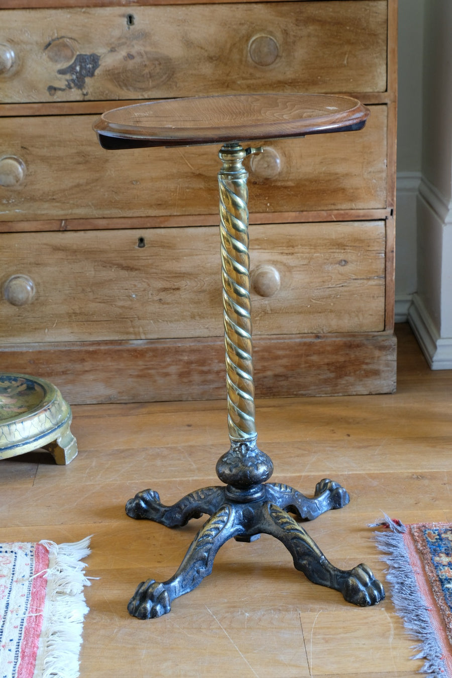 Antique brass telescopic wine table with twisted column and lions paw feet