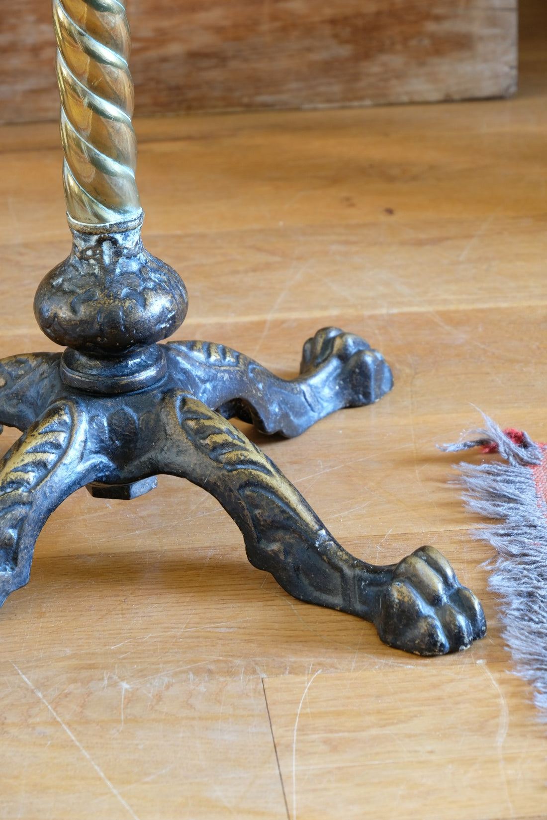 Antique brass telescopic wine table with twisted column and lions paw feet