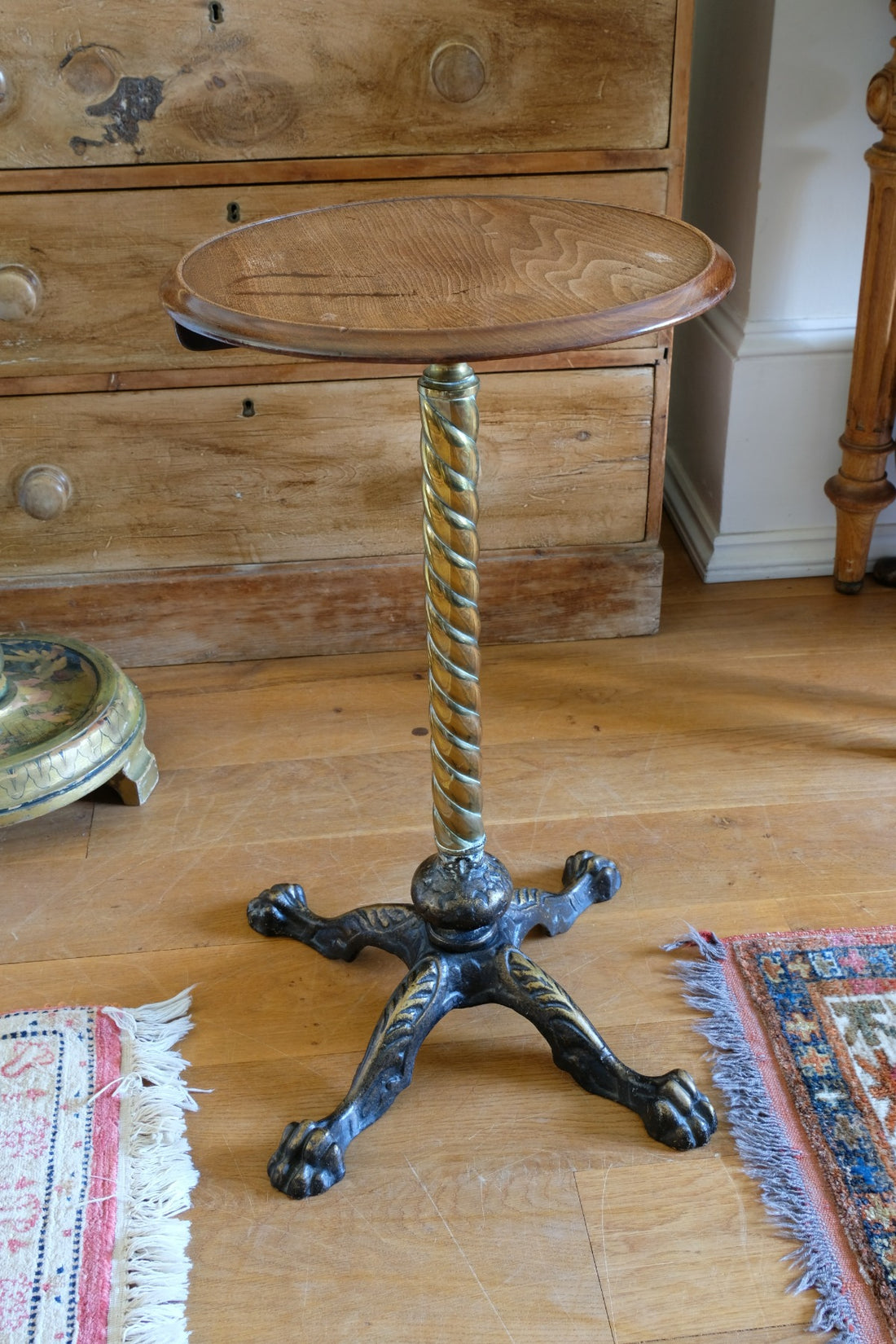 Antique brass telescopic wine table with twisted column and lions paw feet