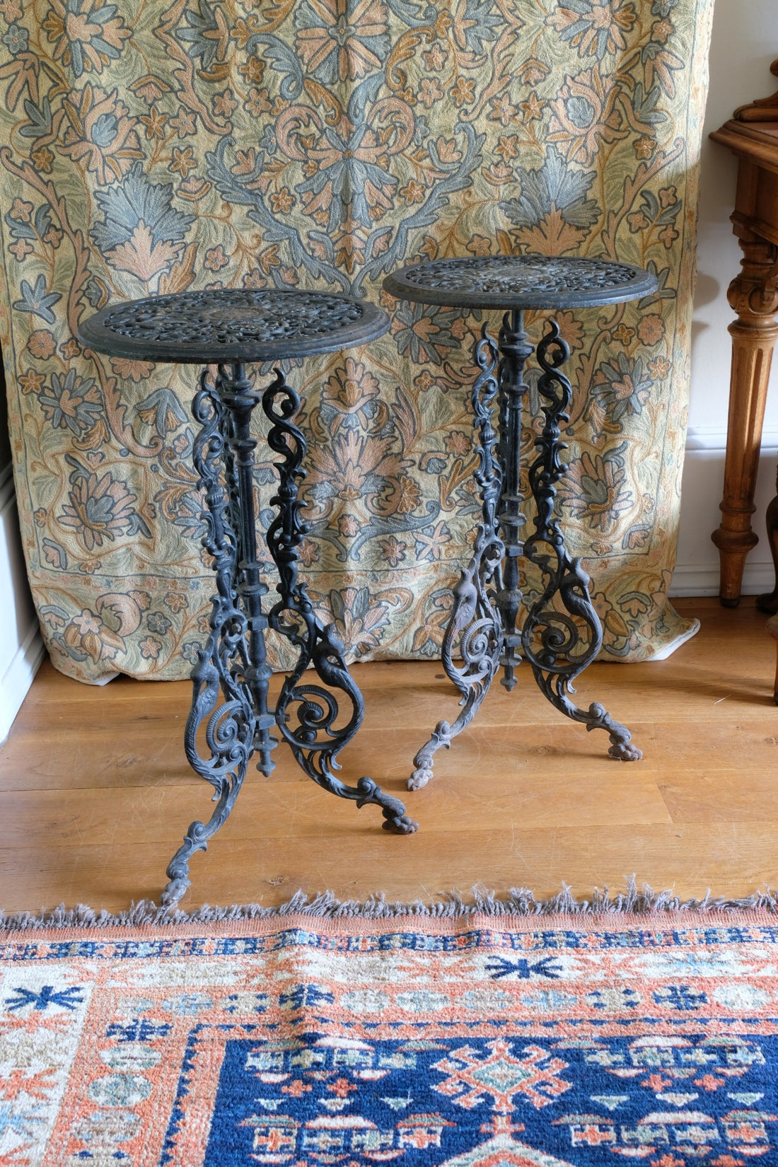 Pair of ornate cast iron tripod tables Circa 1900s