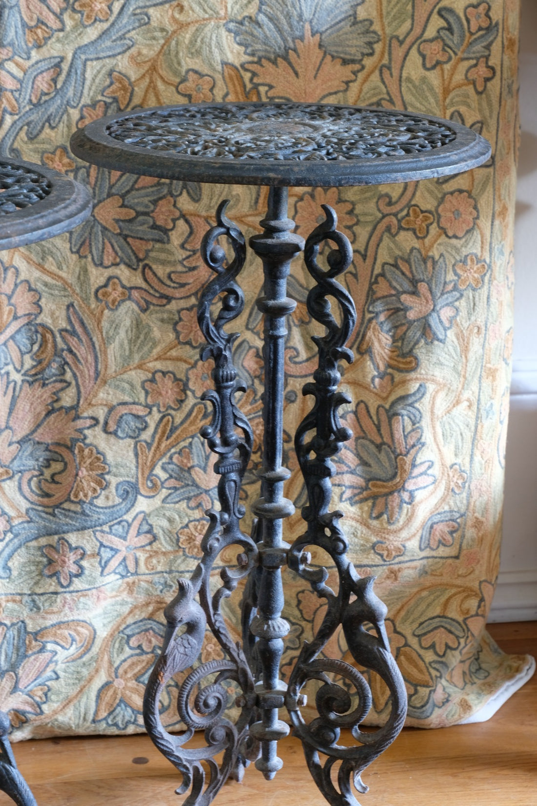 Pair of ornate cast iron tripod tables Circa 1900s
