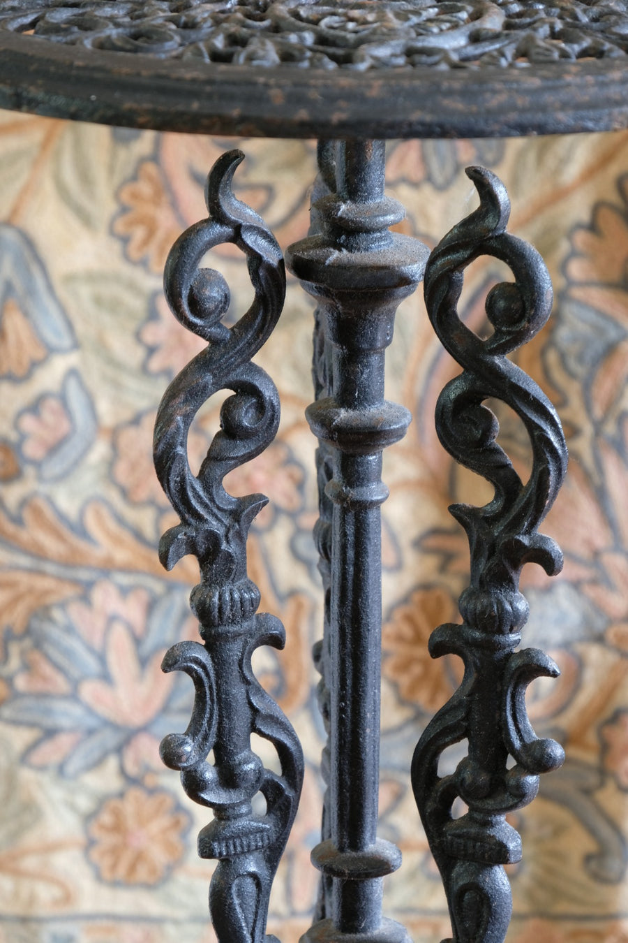 Pair of ornate cast iron tripod tables Circa 1900s