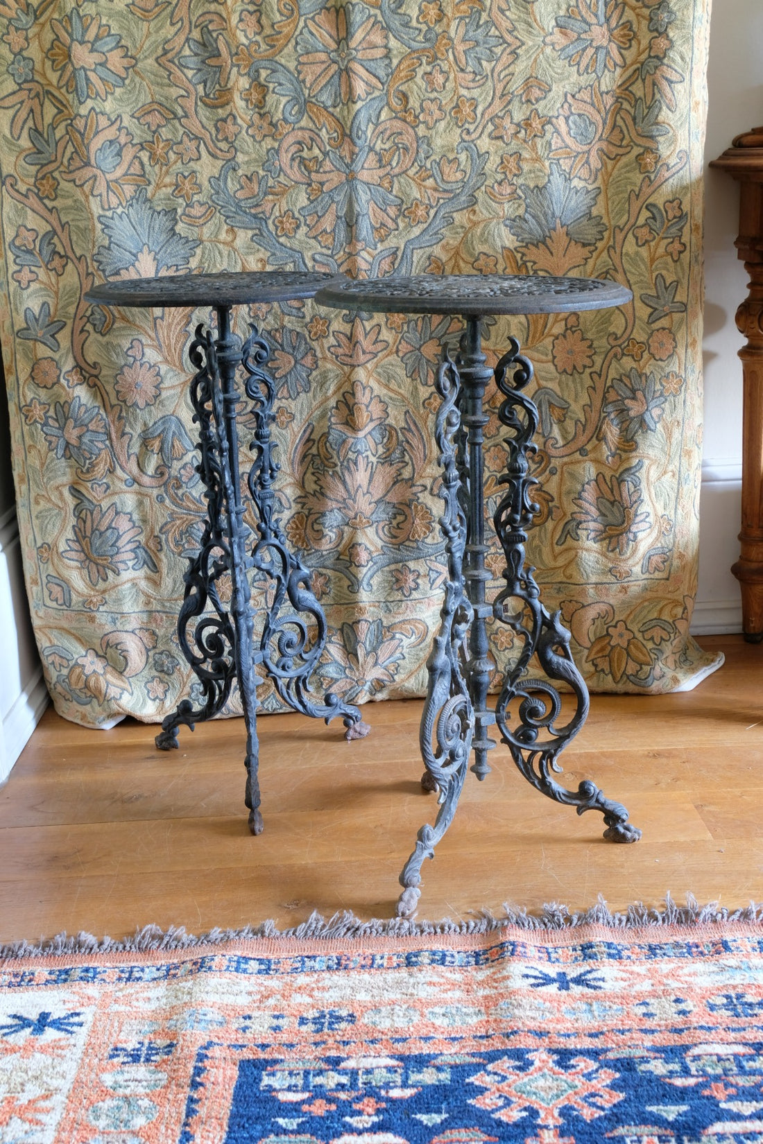 Pair of ornate cast iron tripod tables Circa 1900s