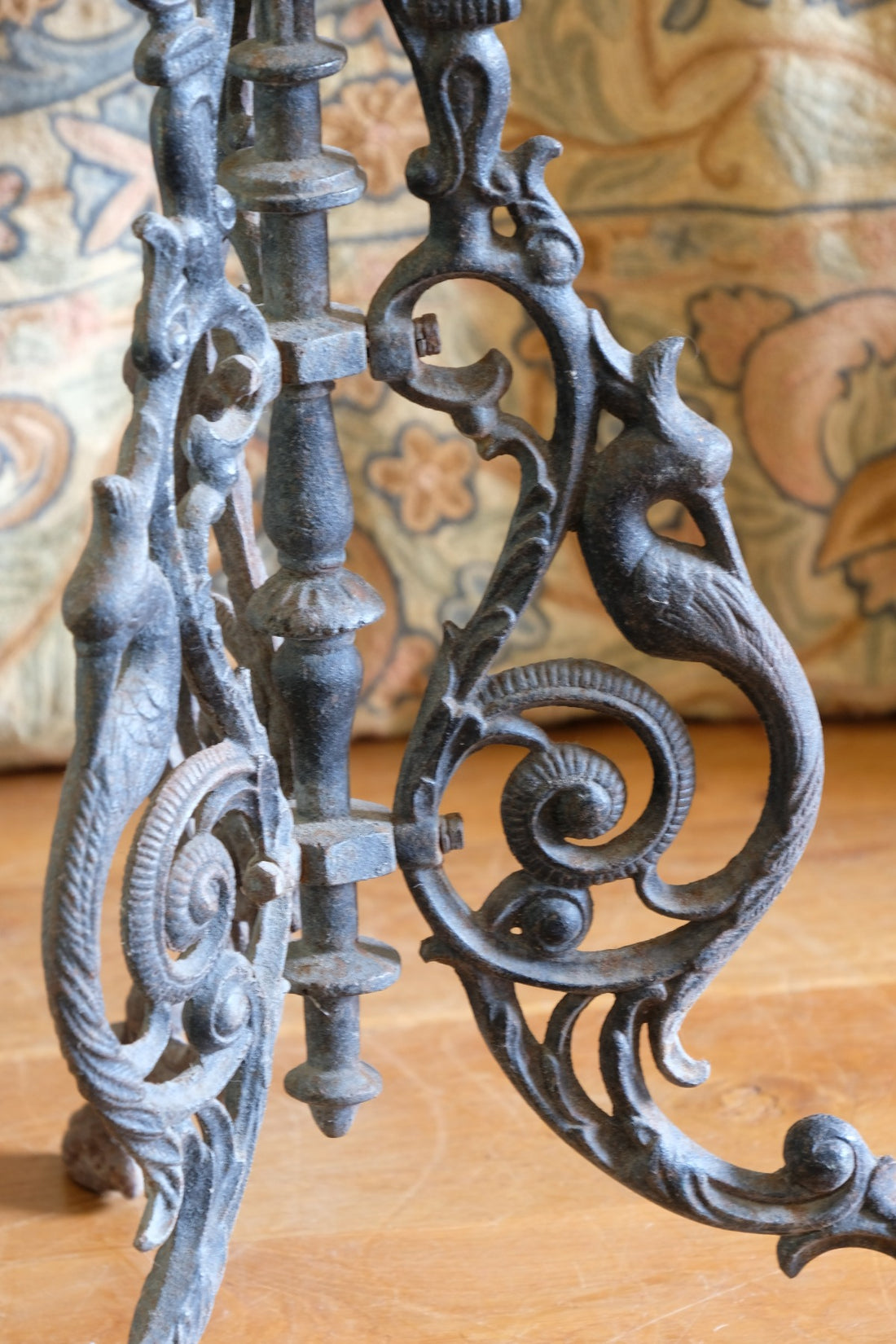 Pair of ornate cast iron tripod tables Circa 1900s