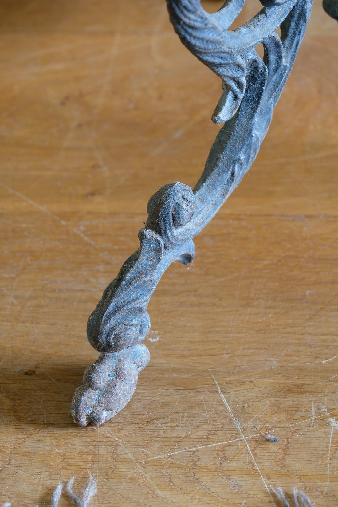 Pair of ornate cast iron tripod tables Circa 1900s