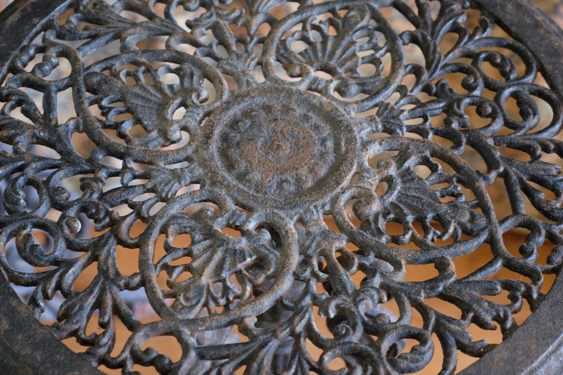 Pair of ornate cast iron tripod tables Circa 1900s