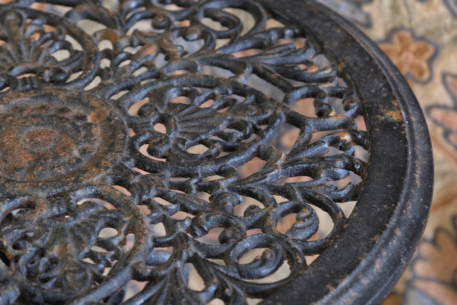 Pair of ornate cast iron tripod tables Circa 1900s