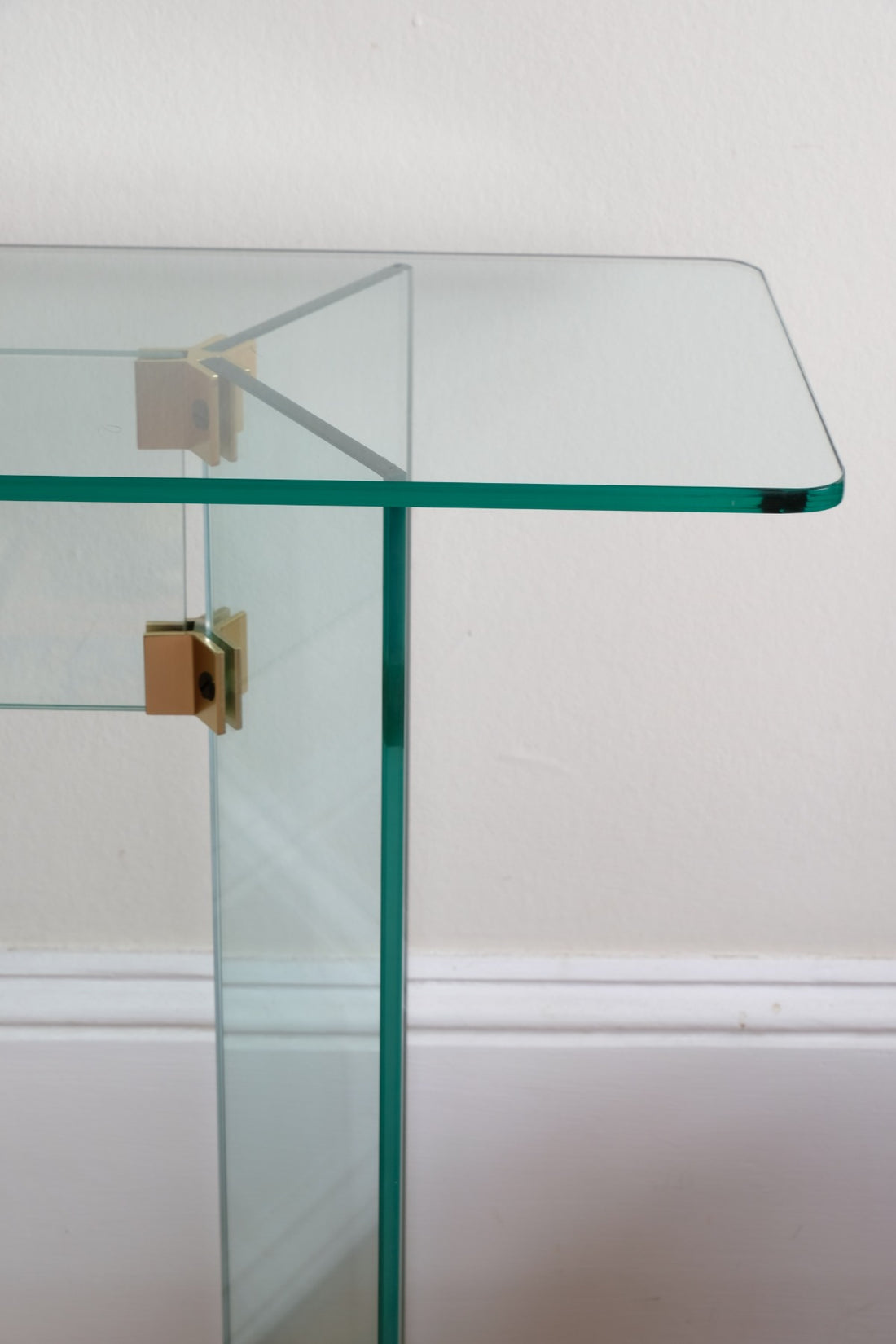 Modern glass hall table in the manner of Leon Rosen