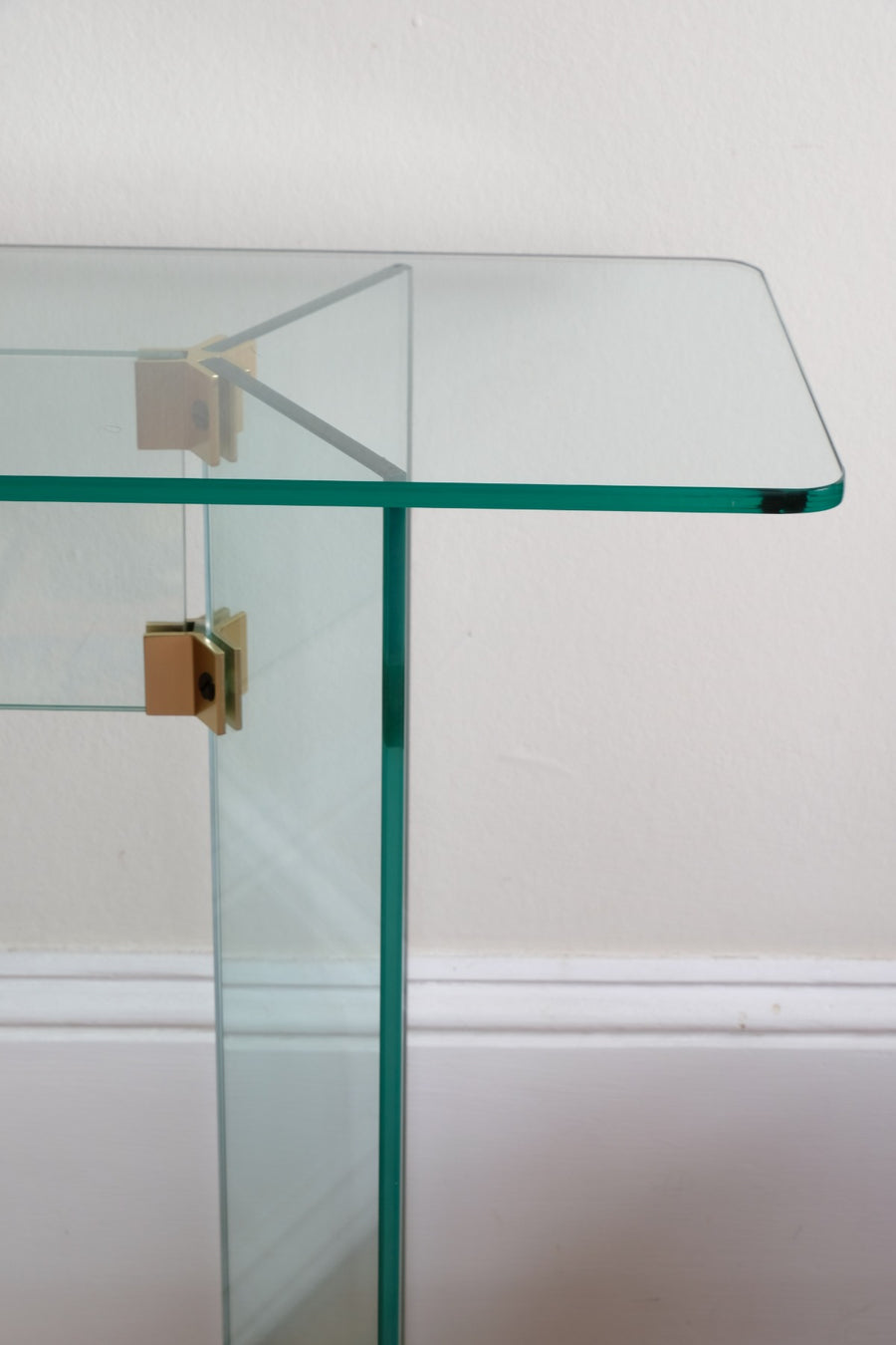 Modern glass hall table in the manner of Leon Rosen
