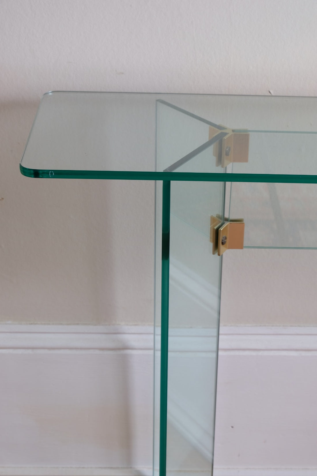 Modern glass hall table in the manner of Leon Rosen