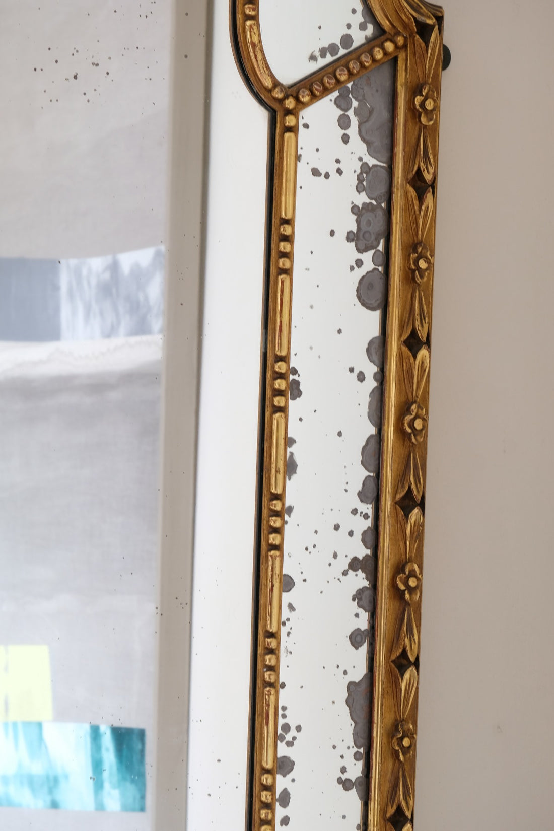 Large antique arched sectional giltwood foxed mirror circa 1910