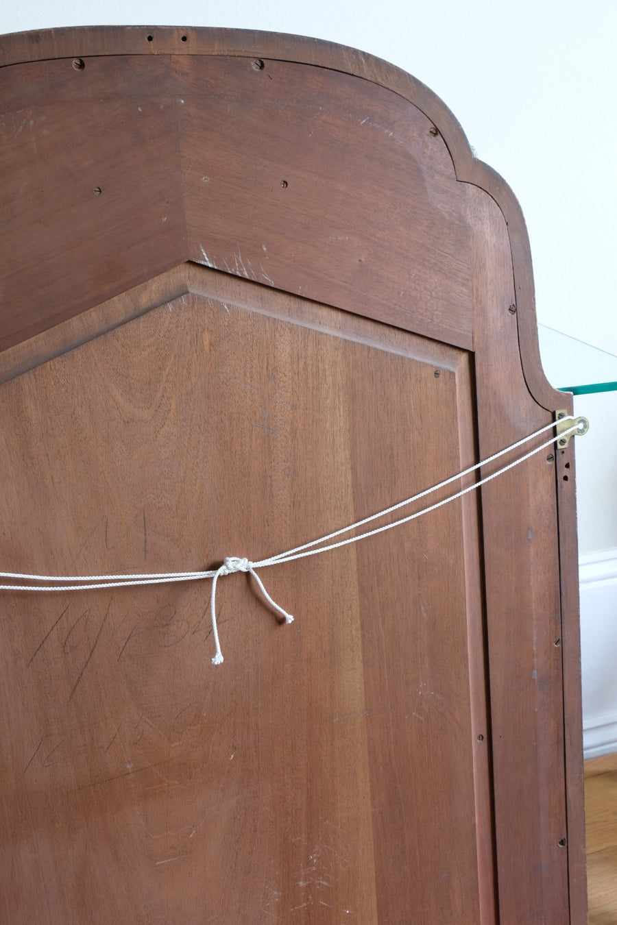 Large antique arched sectional giltwood foxed mirror circa 1910