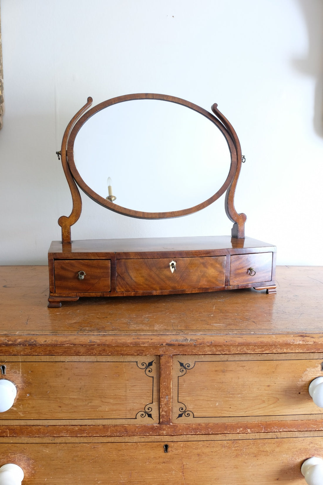 Flamed Mahogany Table Top Oval Mirror With Three Bow Fronted Drawers
