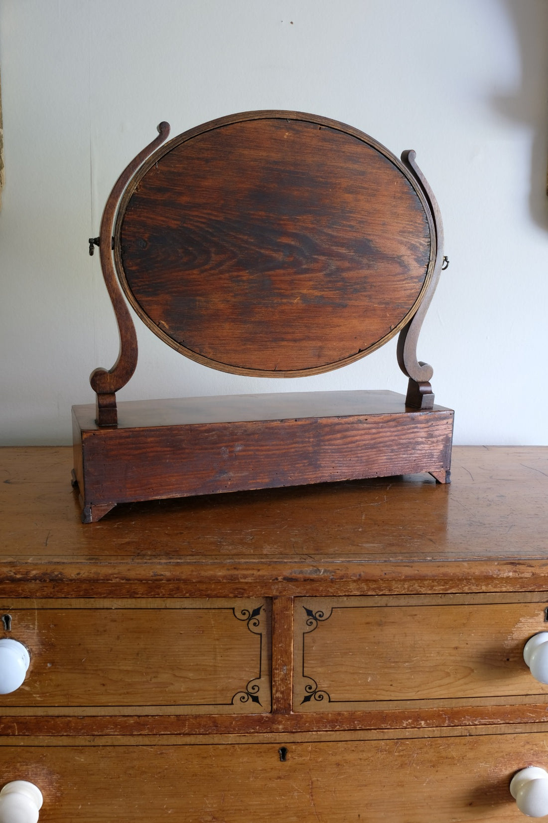 Flamed Mahogany Table Top Oval Mirror With Three Bow Fronted Drawers