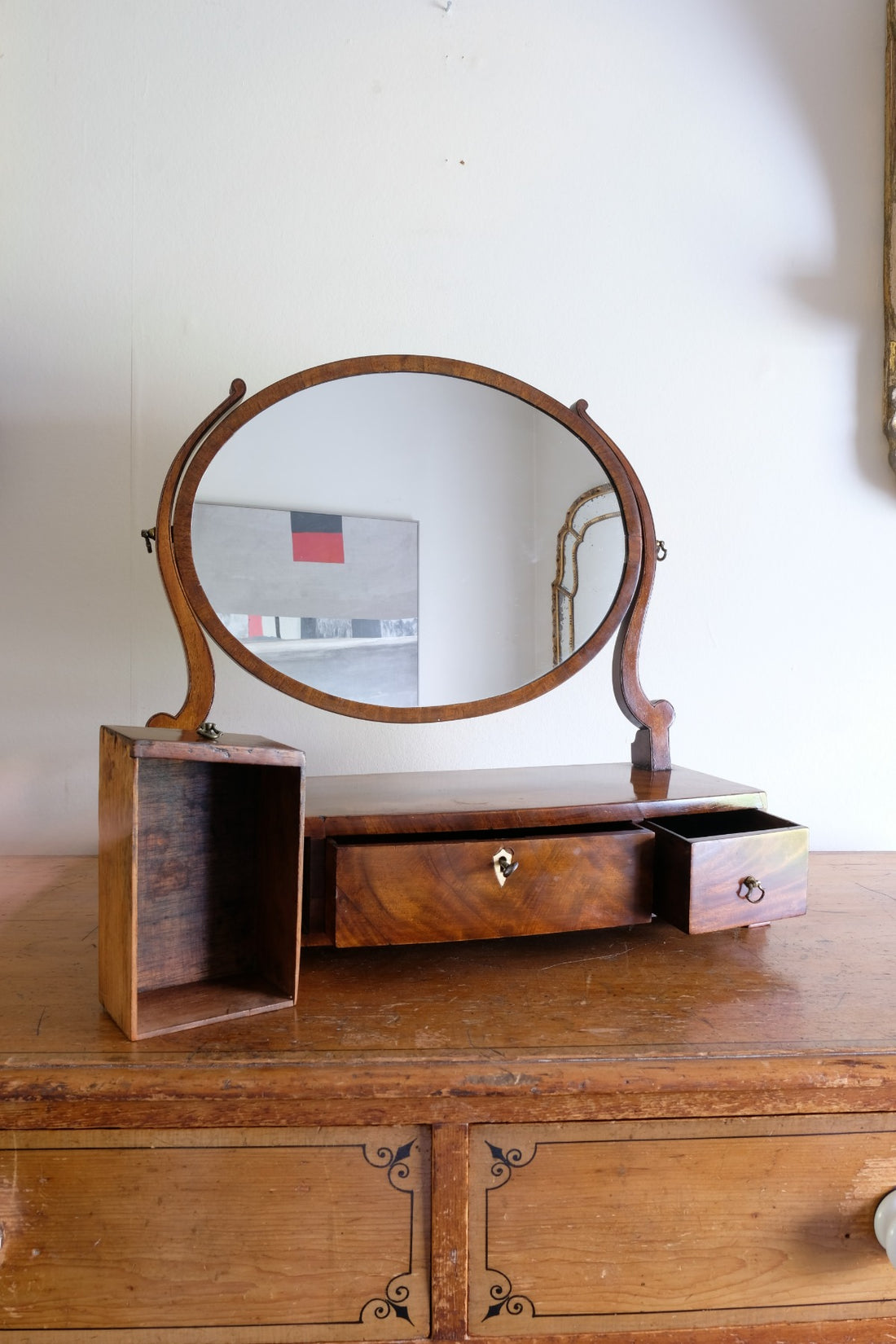 Flamed Mahogany Table Top Oval Mirror With Three Bow Fronted Drawers