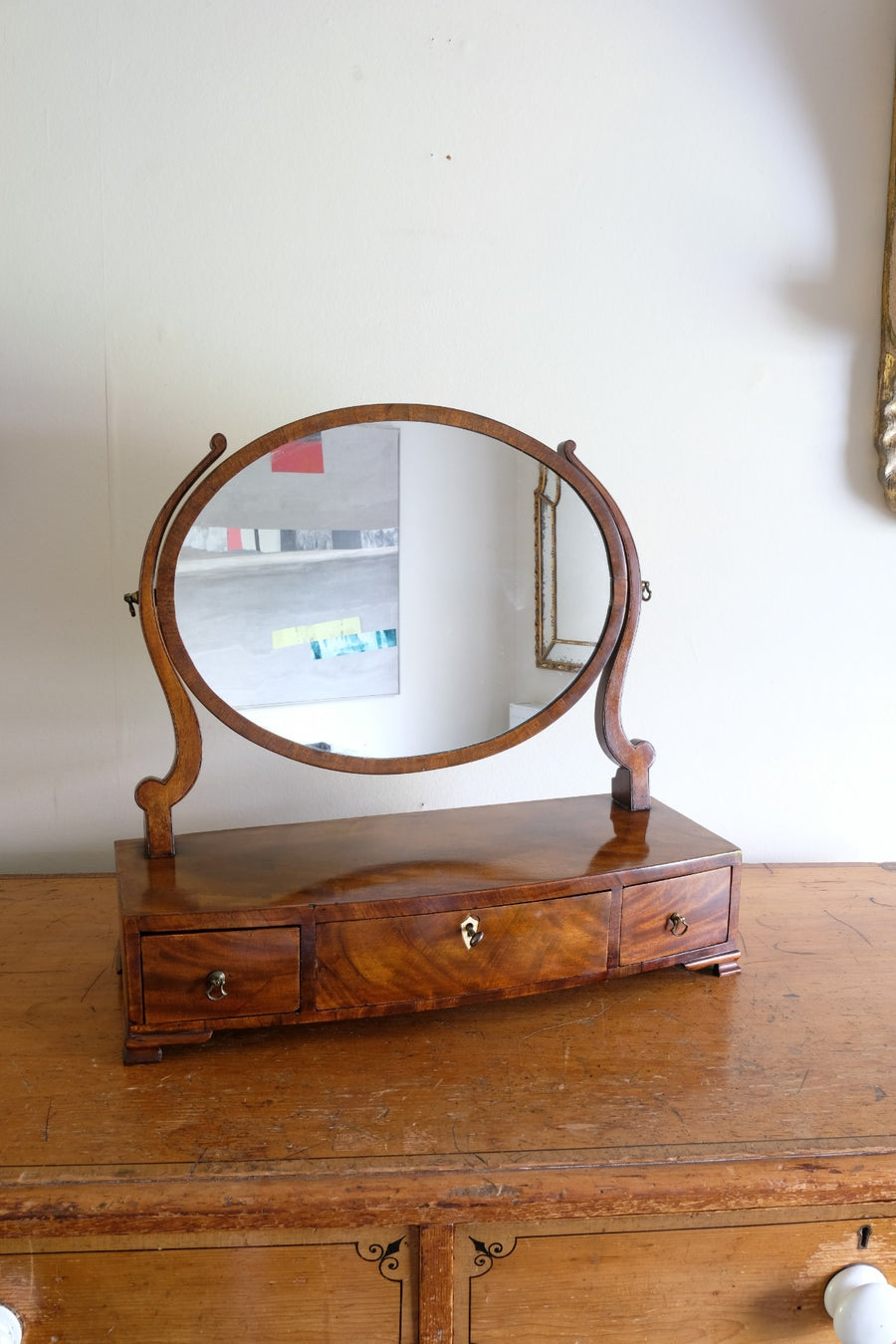 Flamed Mahogany Table Top Oval Mirror With Three Bow Fronted Drawers
