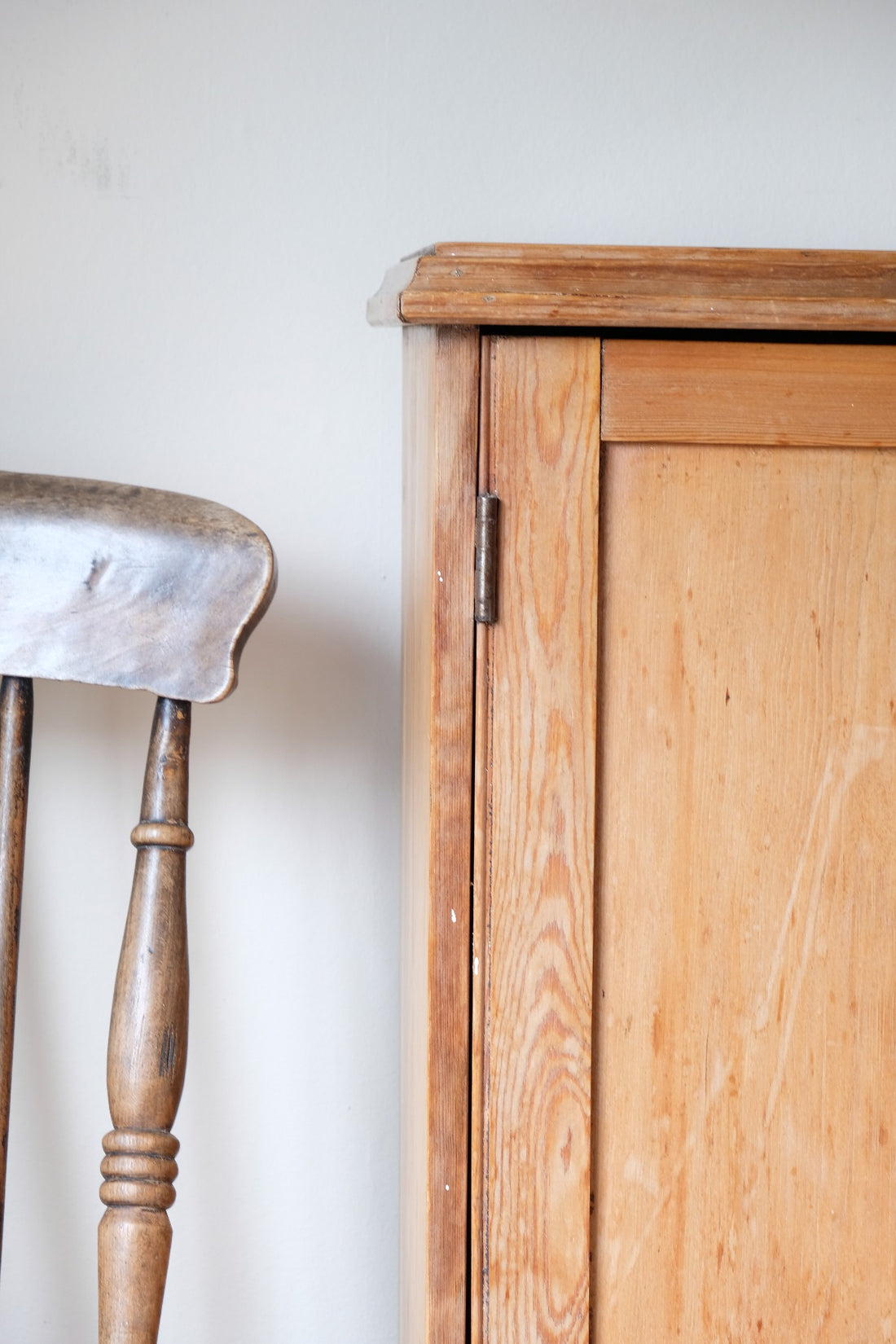 Decorative profile edge on antique pine cupboard