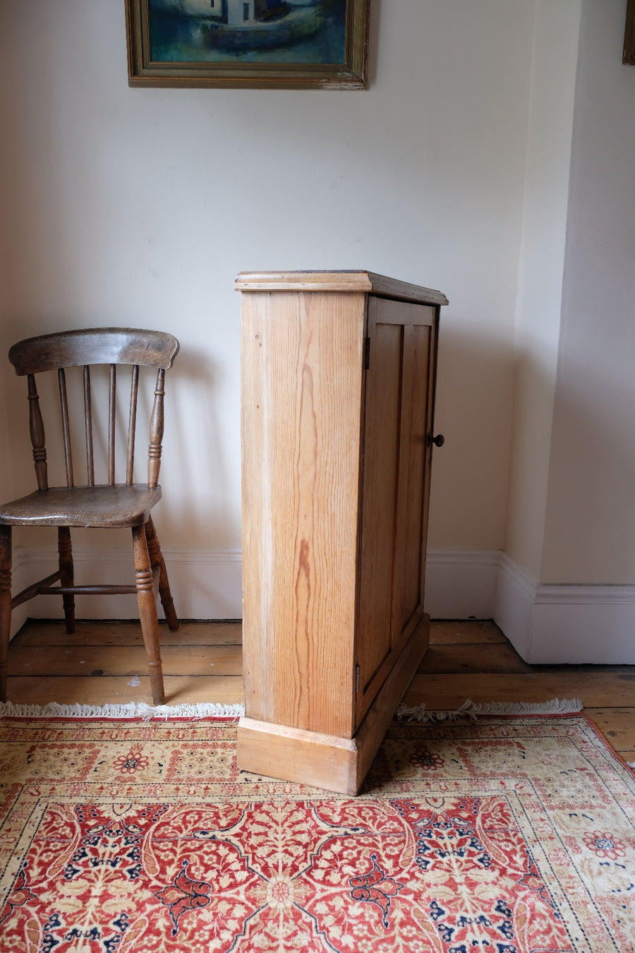 Victorian shallow pine storage cupboard side view